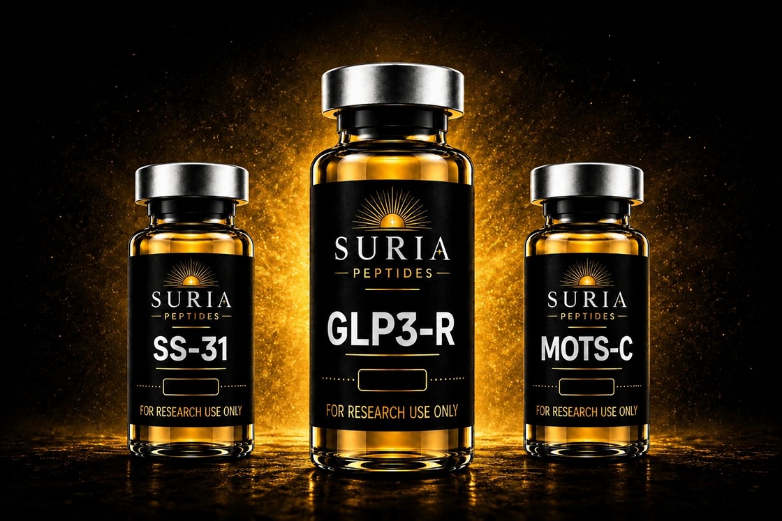 Three Suria Peptides research vials with silver caps and amber glass, labeled SS-31, GLP3-R, and MOTS-c, lit against a dark background with warm gold ambient light