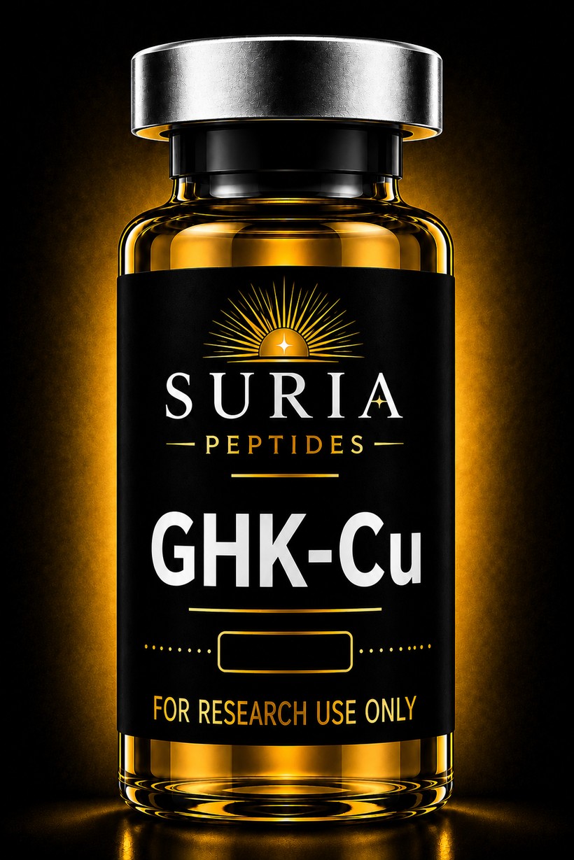 Vial of GHK-Cu research compound with silver cap and Suria label, lit against a dark background with warm gold ambient light